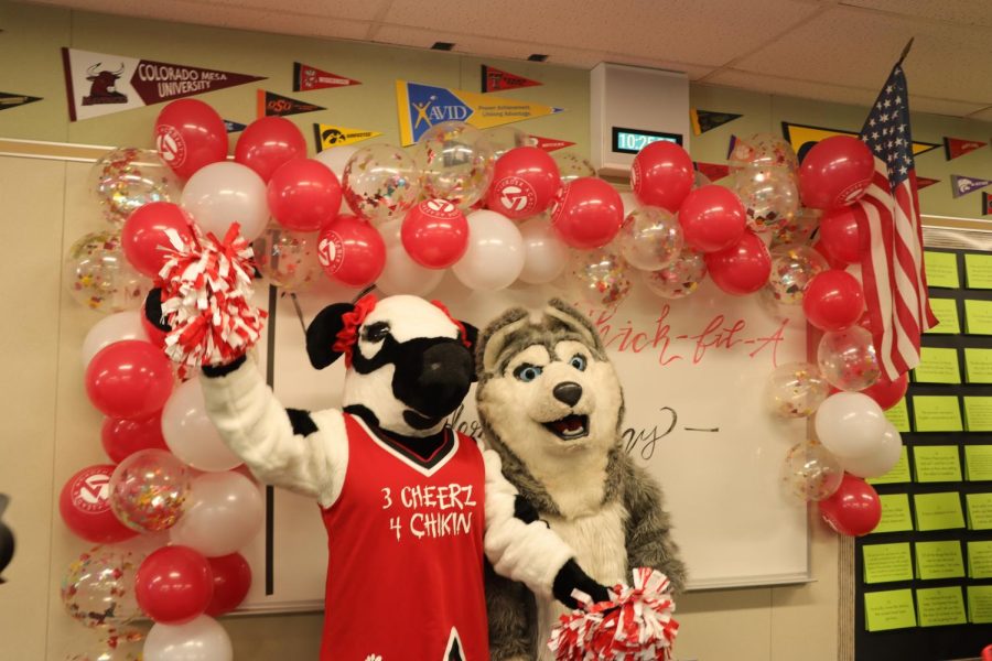 The Chick-fil-A and
SHHS mascots pose for a photo in celebration of the AVID-SHHS partnership.