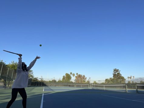 Isabella Zhong on the tennis court during morning practice.