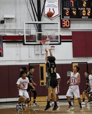 Anthony Clark takes a shot at the game against Covina on December 14.