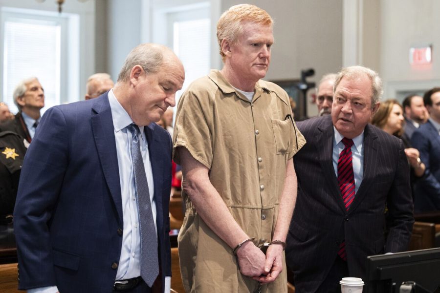 Alex Murdaugh with his attorneys as he was sentenced to two consecutive life terms in prison. 
