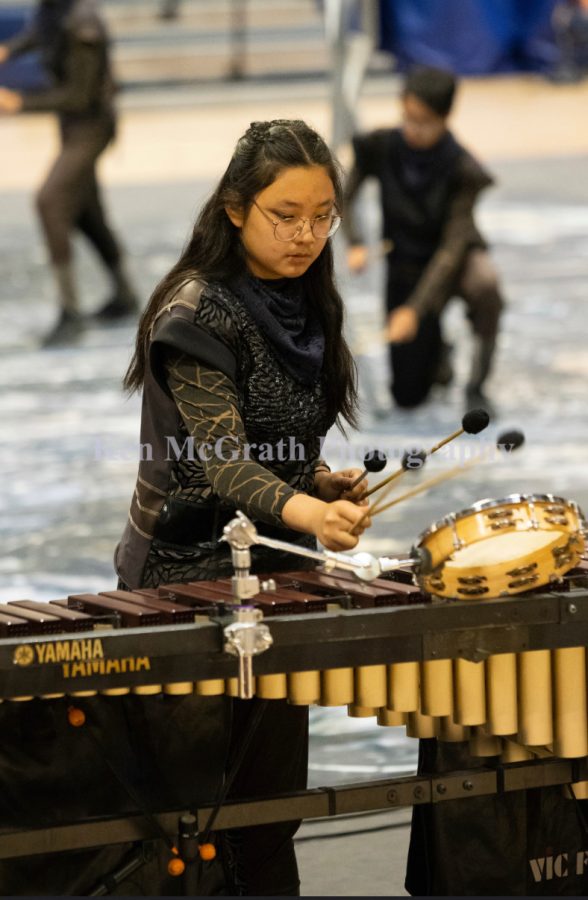 Qing+%28Emma%29+Hou+plays+the+marimba+at+the+Toyota+Arena+for+the+2022+Southern+California+Percussion+Alliance+%28SCPA%29+where+SHHS+placed+third.+