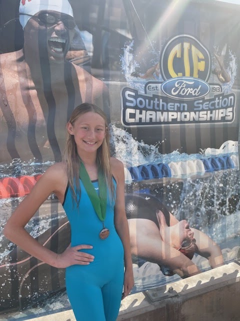 Kaitlyn Crouse poses after winning 4th place in 4x100 relay at CIF finals. 