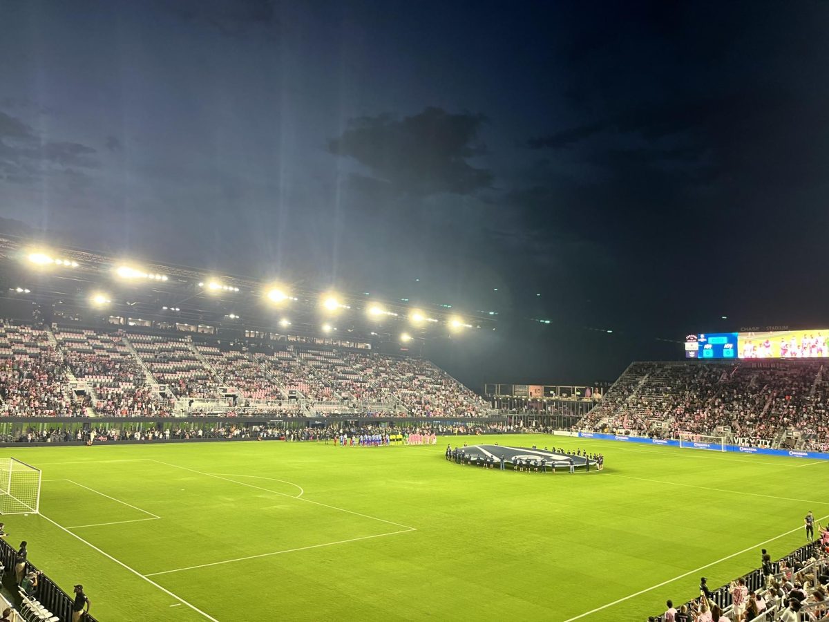 Abraham Lacayo takes a photo from his seat ready to watch the Inter Miami game.