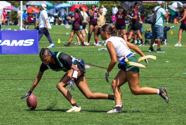 On September 7,  Liv Quezada (12) makes a key play by pulling the receiver's flag.