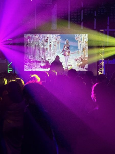 Students crowd the dance floor as the DJ plays energetic music during the winter formal dance on February 7.