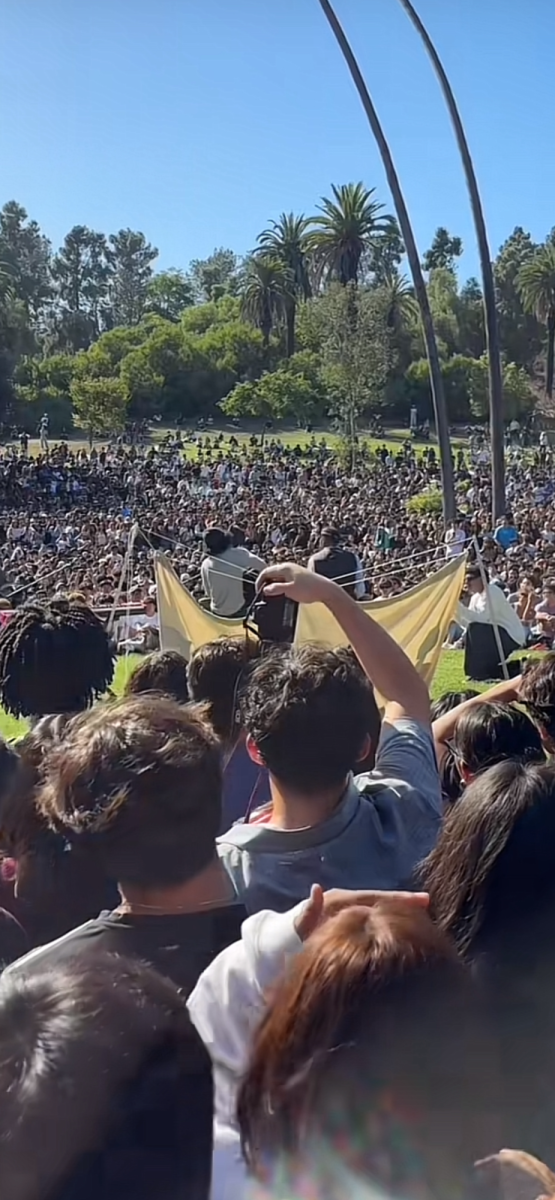 Daniel Caesar sings in front of fans at Elysian Park for his free concert in Los Angeles on Oct. 4. 
