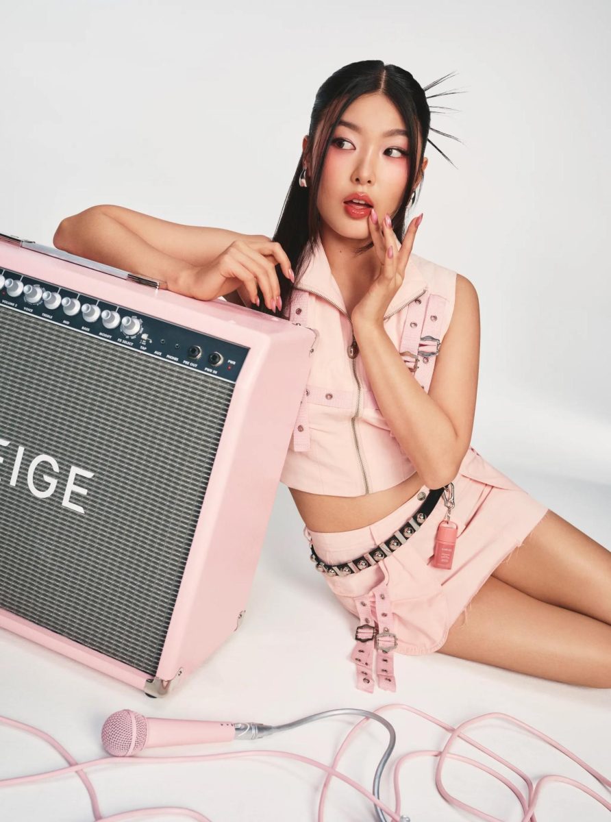 KATSEYE's Yoonchae poses against a speaker with her shade "Lofi Mauve", inspired by her personality as being  more low-key and natural.