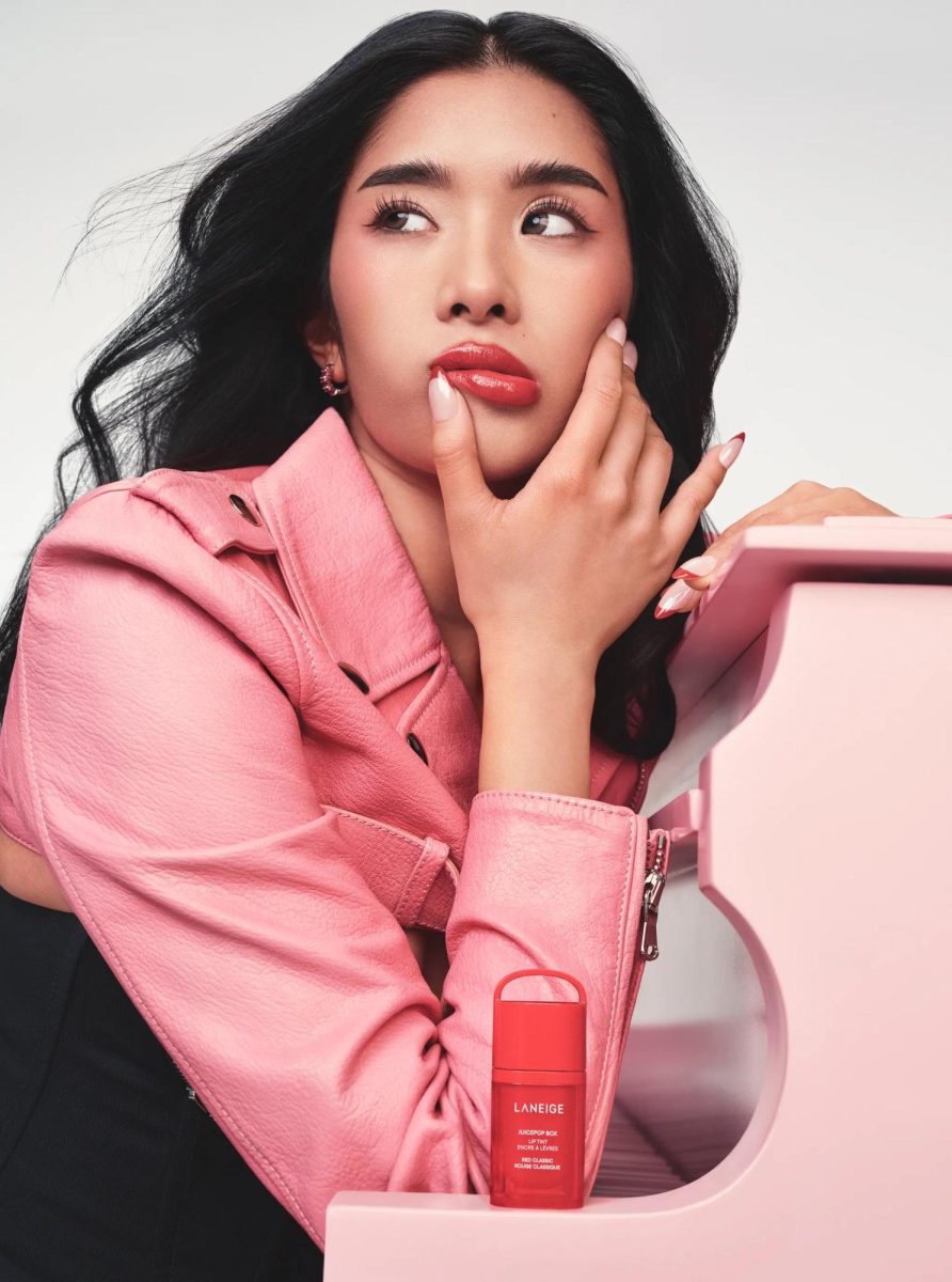 KATSEYE's Sophia poses next to her Juicepop Lip Tint shade "Red Classic", inspired by her classy vibes that she gives, especially considering that she is the leader of the girl group.