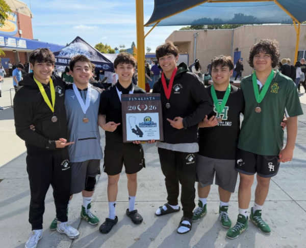 From left to right: Isaac Tessier (10), Dario Ruiz (11), Kayden Vasquez (12), Rex Topete (11), Dominic Espita (12), and Benjamin De la Torre (12) pose for a photo after placing Coastal Division runner-up in CIF on Feb. 14. 
