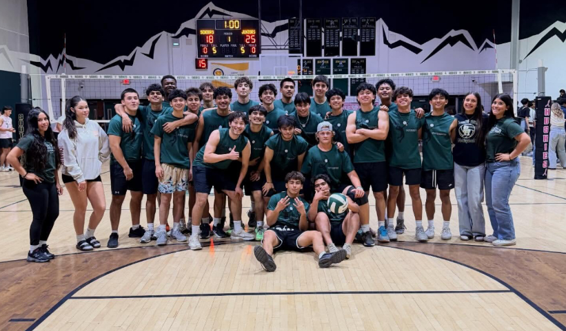 Juniors pose for a photo after winning the boys powderpuff game against the seniors on March 6 in the South Hills gym. 
