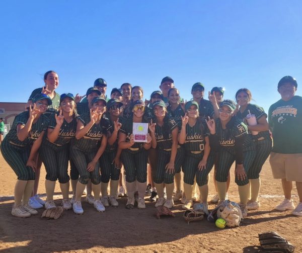 Varsity softball players hold up a celebratory plaque after winning first place in the Whittier Christian High School tournament. 


Photo Credits: @shhssoftball_boosters 

