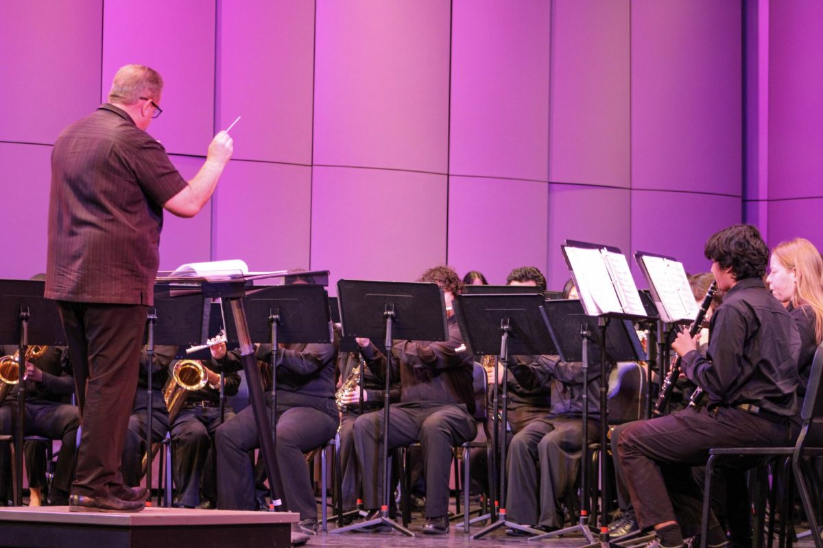 Director of bands Mike Wooten conducts the symphonic band during the Bonita Music Festival on March 6.