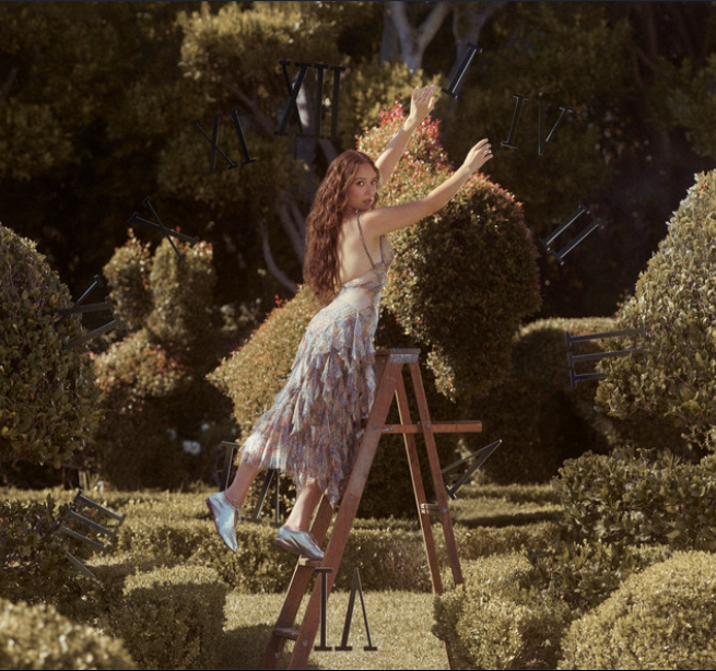 The album cover for Laufey's deluxe album "A Matter of Time: The Final Hour" features Laufey reaching out to get the hours on a clock, a twist to the album cover for "A Matter of Time."